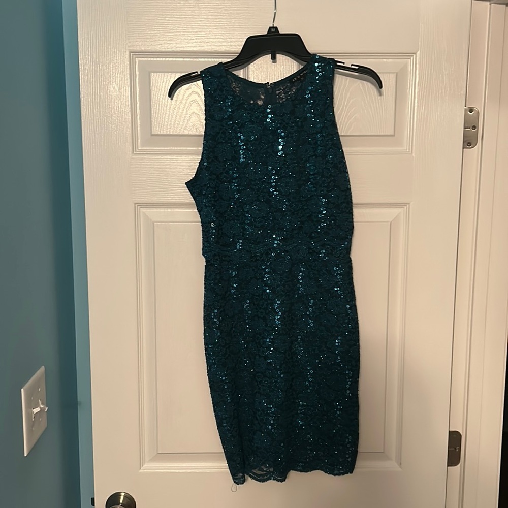 Never worn, wrong size. Fits small/medium.